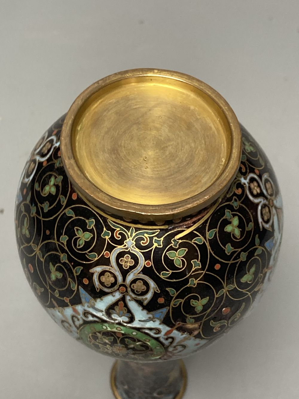 A Chinese powder blue ground vase and a similar cloisonne bottle vase, height 15cm